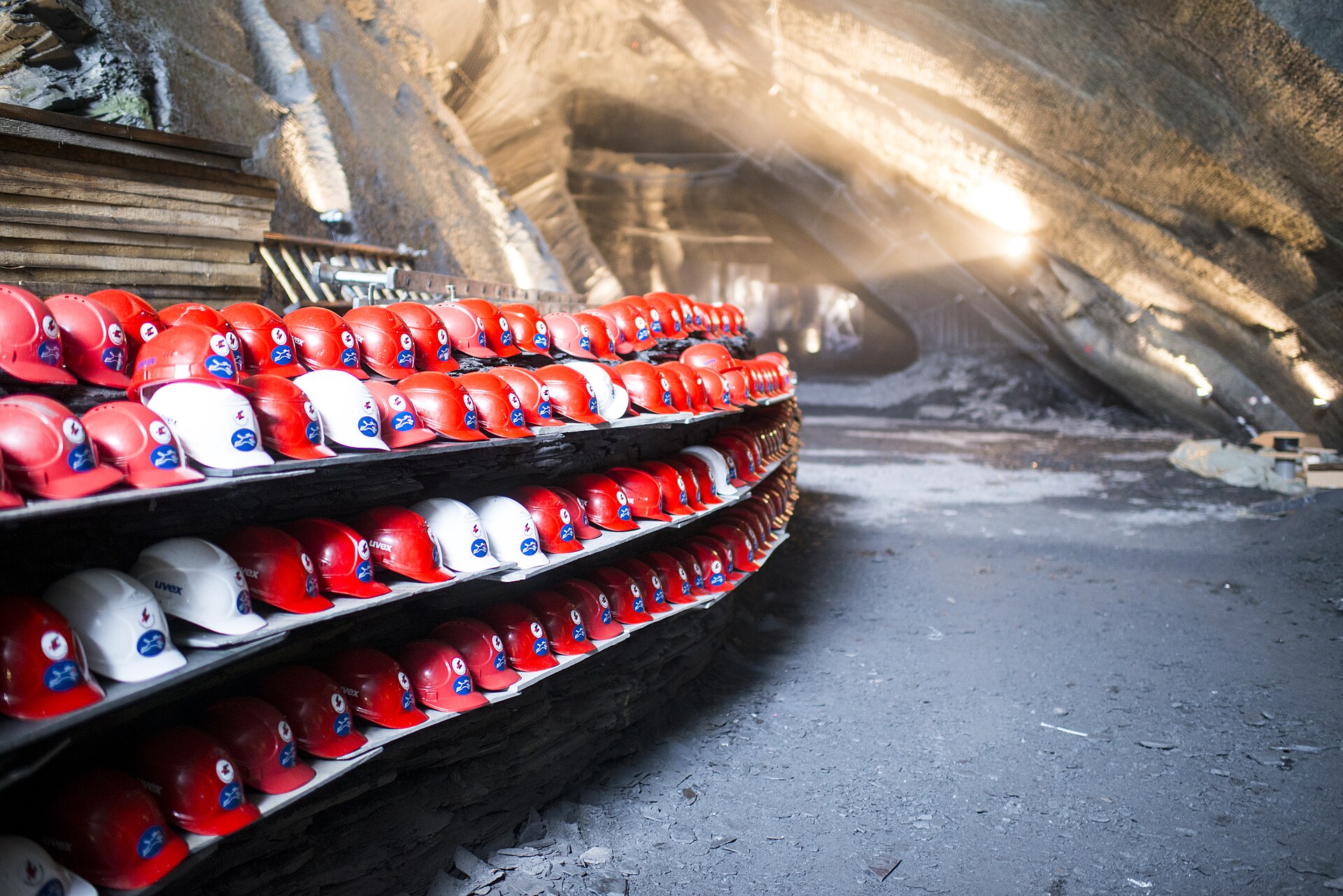 Rows of hard hats racked inside the Landesplattenberg slate mine at Engi, in the Sernftal.
